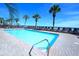 Outdoor pool surrounded by lush landscaping, offering a serene spot for relaxation and recreation at 2311 S Ocean Blvd. # 437, Myrtle Beach, SC 29577