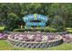 Welcome sign for Myrtle Beach with colorful flowers and greenery at 2311 S Ocean Blvd. # 437, Myrtle Beach, SC 29577