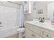 Clean bathroom with a vanity sink, a combination tub and shower, and a toilet at 236 Palm Cove Circle, Myrtle Beach, SC 29588