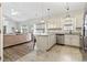 Stylish kitchen with granite countertops, stainless steel appliances, and open view into the living room at 236 Palm Cove Circle, Myrtle Beach, SC 29588