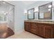 Bathroom featuring a double vanity with granite countertops at 28 Grey Moss Rd., Murrells Inlet, SC 29576