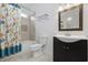 Bathroom featuring a tub and shower combo, vanity with a sink, and tile floors at 28 Grey Moss Rd., Murrells Inlet, SC 29576