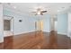Spacious bedroom with hardwood floors, ceiling fan, ensuite bath and walk-in closet at 28 Grey Moss Rd., Murrells Inlet, SC 29576