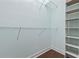 Walk-in closet with shelving and hanging racks at 28 Grey Moss Rd., Murrells Inlet, SC 29576