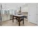 Well-equipped kitchen with stainless steel appliances, granite countertops, white cabinetry and tiled backsplash at 28 Grey Moss Rd., Murrells Inlet, SC 29576