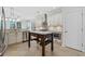 Modern kitchen featuring stainless steel appliances, custom white cabinetry and an island with storage at 28 Grey Moss Rd., Murrells Inlet, SC 29576