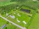 Lush aerial view of a neighborhood with a pond and greenery at 2829 Highway 129, Galivants Ferry, SC 29544