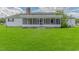 Spacious backyard featuring a screened porch, perfect for outdoor relaxation and entertaining at 2829 Highway 129, Galivants Ferry, SC 29544