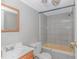 Bathroom with a shower-tub, vanity, and a grey-tiled shower-tub surround at 2829 Highway 129, Galivants Ferry, SC 29544