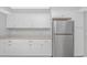 Clean kitchen with stainless steel appliances, white cabinets, and plenty of counter space at 2829 Highway 129, Galivants Ferry, SC 29544