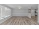 Bright and airy living room with neutral tones, ceiling fan and views to other rooms at 2829 Highway 129, Galivants Ferry, SC 29544