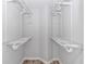 This walk-in closet offers plenty of storage with built-in shelving at 2829 Highway 129, Galivants Ferry, SC 29544