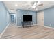 Bedroom featuring light blue walls and floors with a TV, recessed lighting and ceiling fan at 2885 Desert Rose St., Little River, SC 29566