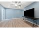 Bedroom featuring light blue walls and floors with a TV, recessed lighting and ceiling fan at 2885 Desert Rose St., Little River, SC 29566