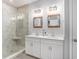 Modern bathroom showcasing a glass shower, double vanity, and stylish fixtures for a luxurious feel at 294 Splendor Circle, Murrells Inlet, SC 29576