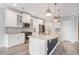 Modern kitchen with granite countertops, stainless steel appliances and hardwood floors at 294 Splendor Circle, Murrells Inlet, SC 29576