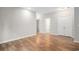Spacious living room with hardwood floors, neutral walls, and abundant natural light at 294 Splendor Circle, Murrells Inlet, SC 29576
