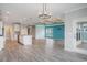 Open-concept living space connecting the kitchen and living room with modern finishes at 294 Splendor Circle, Murrells Inlet, SC 29576