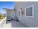 The back porch offers a cozy place to relax with two chairs at 3307 Nixon St., North Myrtle Beach, SC 29582