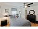 Nautical themed bedroom featuring a ceiling fan, wood floors, and Americana decor at 3307 Nixon St., North Myrtle Beach, SC 29582