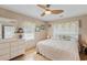 Charming bedroom features a comfortable bed, neutral decor, and ample natural light at 3307 Nixon St., North Myrtle Beach, SC 29582