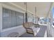 Relax on the cozy front porch swing of this beach house, perfect for enjoying lazy afternoons at 3307 Nixon St., North Myrtle Beach, SC 29582