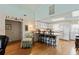 Open kitchen with a breakfast bar, white cabinets, and stylish bar stools at 3307 Nixon St., North Myrtle Beach, SC 29582