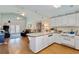 Bright kitchen with a vaulted ceiling, an island with bar seating, and access to an outdoor area at 3307 Nixon St., North Myrtle Beach, SC 29582