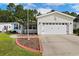 Charming single story home with a well manicured lawn, vinyl siding and a two car garage at 333 Walden Lake Rd., Conway, SC 29526