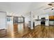 An open floor plan with hardwood floors featuring a kitchen and living room at 333 Walden Lake Rd., Conway, SC 29526