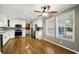 Bright kitchen featuring white cabinetry, stainless steel appliances, and two windows at 333 Walden Lake Rd., Conway, SC 29526
