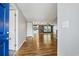 View of living room from hallway entrance with hardwood floors and open floor plan at 333 Walden Lake Rd., Conway, SC 29526