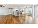 Open-concept living space with modern finishes and beautiful flooring throughout kitchen and living areas at 333 Walden Lake Rd., Conway, SC 29526
