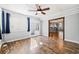 Bright sunroom with hardwood floors, white trim, and multiple windows, great for any use at 333 Walden Lake Rd., Conway, SC 29526