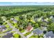 Aerial shot of a residential area featuring tree-lined streets, well-manicured lawns, and community charm at 35 Easter Lilly Ct., Murrells Inlet, SC 29576