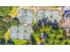 Overhead view of the community's well-maintained tennis courts, surrounded by lush greenery at 35 Easter Lilly Ct., Murrells Inlet, SC 29576