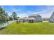 Picture of the home's backyard featuring a privacy fence and patio with seating at 356 Ocean Commons Dr., Surfside Beach, SC 29575