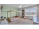 Bright bedroom with a unique toddler bed frame and natural light from a large window at 356 Ocean Commons Dr., Surfside Beach, SC 29575
