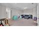 Large bonus room featuring comfortable seating, carpeted floors, and ample space for recreation at 356 Ocean Commons Dr., Surfside Beach, SC 29575