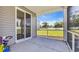 Screened in patio with a large sliding door that allows in a lot of natural light at 356 Ocean Commons Dr., Surfside Beach, SC 29575