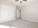Bedroom features carpet, double door closet, and a ceiling fan at 369 Log Cabin Rd., Loris, SC 29569