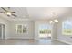 Open-concept room with plank flooring, ceiling fan, and large window at 369 Log Cabin Rd., Loris, SC 29569