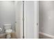 Powder room featuring a toilet, base-molding and tile flooring at 380 Babylon Pine Dr., Myrtle Beach, SC 29579