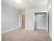 Carpeted bedroom featuring an open closet and neutral-colored walls at 380 Babylon Pine Dr., Myrtle Beach, SC 29579