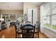 Bright dining area with natural light, elegant decor, and comfortable seating for six at 388 Sea Turtle Dr., Myrtle Beach, SC 29588