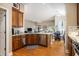 Open kitchen featuring stainless steel appliances and views to the dining area at 388 Sea Turtle Dr., Myrtle Beach, SC 29588