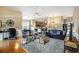 Cozy living room with hardwood floors, patterned chairs, and plush rug at 388 Sea Turtle Dr., Myrtle Beach, SC 29588