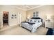 Spacious main bedroom with plush carpeting, natural light, and elegant decor at 388 Sea Turtle Dr., Myrtle Beach, SC 29588