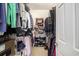 Organized walk-in closet with shelves, rods, shoe racks, and ample storage space for clothing and accessories at 388 Sea Turtle Dr., Myrtle Beach, SC 29588