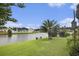 Picturesque water view featuring a well-maintained lawn, lush landscaping, and inviting waterfront scenery at 388 Sea Turtle Dr., Myrtle Beach, SC 29588